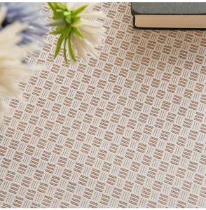 Close-up of French lace tablecloth with hollow-out square woven texture detail