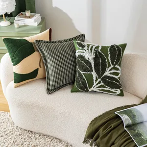 Housses de coussin vert artistique avec motifs de feuilles et pied-de-poule
