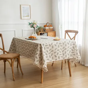 Elegant French country style dining tablecloth with green leaf pattern and white tassels