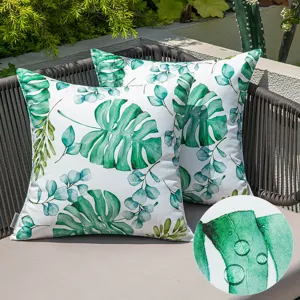 Waterproof outdoor pillow covers with tropical green leaf print for garden decor