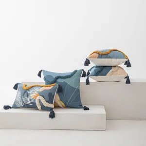 Modern Morandi tufted cushion covers with tassels and botanical prints on white blocks