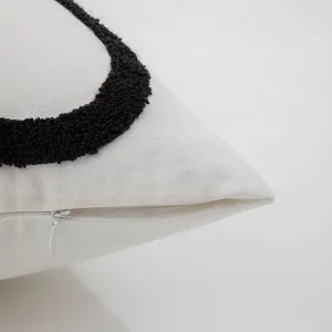 Minimalist Nordic style embroidered pillowcase featuring a hidden zipper and tufted texture