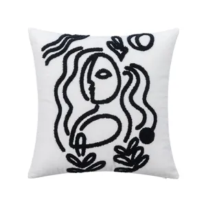 Nordic style embroidered pillowcase with minimalist black abstract face design