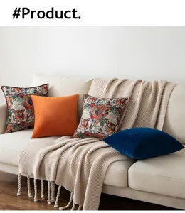 Cozy lifestyle scene featuring vintage tiger jacquard and velvet cushion covers on a sofa