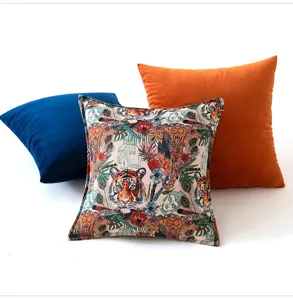 Detailed view of vintage tiger jacquard throw pillow with colorful tropical floral pattern