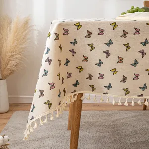 Cotton linen tablecloth with colorful butterfly print and decorative tassel fringe