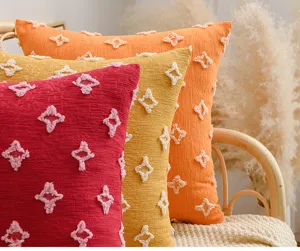 Detailed close-up of boho cotton tufted pillow covers with white star pattern for home decor