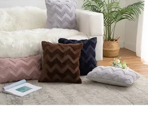 Close-up of Nordic zigzag plush pillow covers in various colors arranged on a sofa.