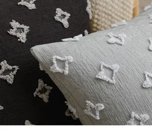 Close-up of Nordic tufted cotton pillow case with star pattern and soft texture
