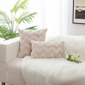 Nordic beige plush pillow covers with wave pattern on a white sofa in a bright room