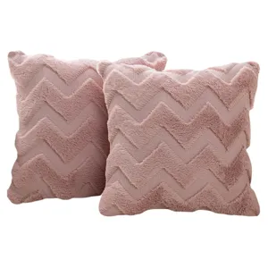 Set of two plush pink cushion covers featuring a stylish geometric zigzag wave pattern
