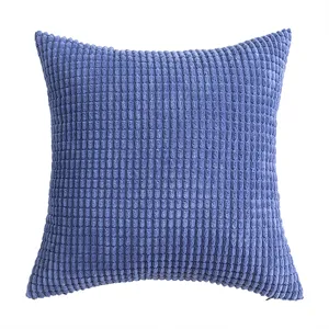 Square blue corduroy throw pillow cover with corn grain texture on white background