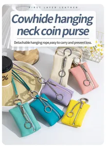 Macro view of colorful cowhide coin purses with detachable neck ropes and metal zippers