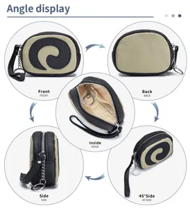 Detailansichten der Leder-Münzbörse in Schweizer Rollenform mit Handgelenkschlaufe