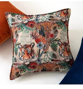 Close-up view of vintage jacquard tiger and elephant patterns on artistic premium cushion cover