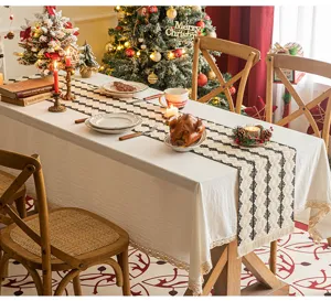 Detailed view of a woven boho table runner on a festive dining table