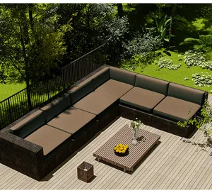 Detailed view of brown waterproof cushion covers on an L-shaped outdoor rattan sofa