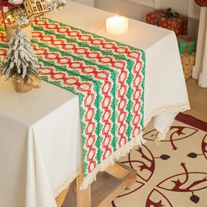 Festive red and green woven cotton linen Christmas table runner with elegant fringe tassels