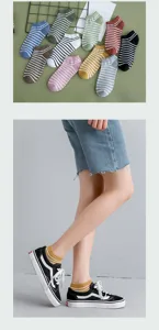 Detail of striped cotton ankle socks for women styled with casual sneakers