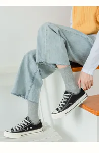 Comfortable cotton mid-tube socks for daily wear, cozy knit design in versatile grey color.