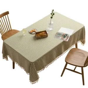 Nordic green checkered rectangular tablecloth with tassels and decorative fringe detail