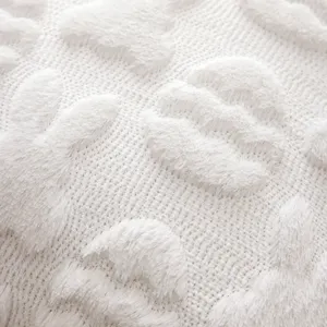 White plush Easter pillowcase featuring soft raised egg and rabbit textures for home decor