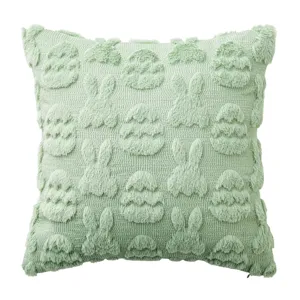 Sage green plush Easter throw pillow cover with decorative tufted egg and bunny patterns