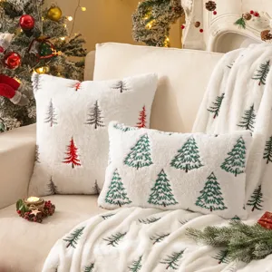 White faux fur pillow cover with embroidered Christmas trees for holiday sofa decoration