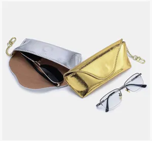 Metallic crackle texture genuine leather glasses cases with portable keychain hooks.