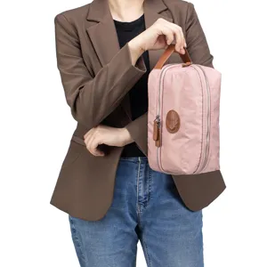 Rosa wasserfeste Reise-Kulturtasche für Damen mit Ledergriff und Doppelreißverschluss