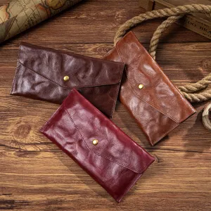 Portafogli lunghi vintage in pelle conciata al vegetale in tre varianti di colore