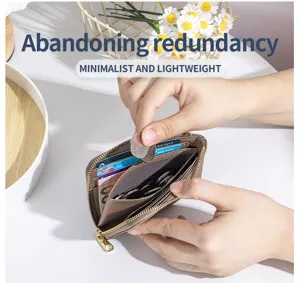 Close-up of hands putting coins into a slim brown leather wallet with card slots