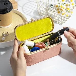 Mini-Schmucktasche aus echtem Leder in Rosa mit Kussverschluss für Lippenstifte und mehr