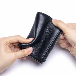 Kleine Damen Geldbörse aus echtem Leder, schwarzes Portemonnaie mit Narbung, kompakt.