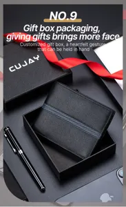 Close-up view of a premium striped men's leather wallet in an elegant black gift box.