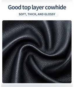 Close-up detail of high-quality top layer black cowhide leather texture with glossy finish