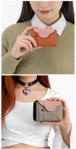 Gros plan du porte-cartes en cuir éléphant mignon dans la main