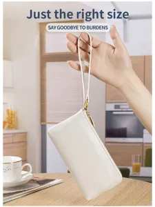 Elegant handheld view of a white genuine leather long zipper wallet with a wristlet strap