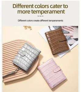 Various colors of crocodile pattern leather passport holders with neck straps