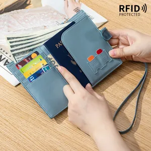 Large capacity genuine leather passport holder with crocodile pattern for safe travel.