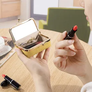 Kleine tragbare Schmuck- und Lippenstiftbox aus gelbem Leder mit eingebautem Spiegel