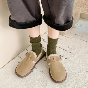 Warm green wool mid-calf socks for women featuring a cozy thickened pile texture.