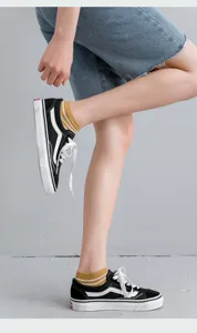Stylish women's yellow and white striped breathable cotton ankle socks in preppy style