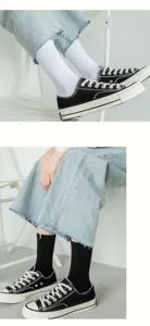 Classic solid mid-tube cotton socks for men and women, comfortable daily casual wear.