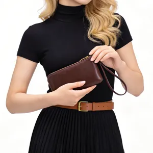 Elegant brown genuine leather clutch wallet for women with a functional wristlet strap