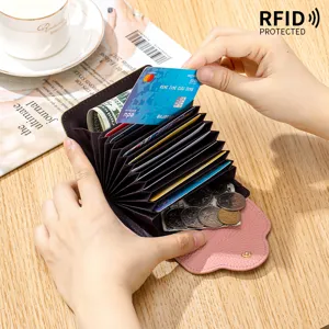 Porte-cartes en cuir véritable avec protection RFID et poche à monnaie rose