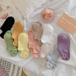 Collection of various dopamine color invisible boat socks with a soft ribbed cotton texture