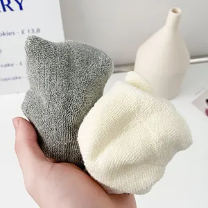Pair of thick gray and cream winter warm fuzzy socks with ultra soft loop texture.