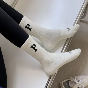 White mid-calf crew socks with embroidered P letter for winter warmth and comfort