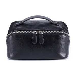Elegante schwarze Kosmetiktasche aus echtem Leder mit großem Fassungsvermögen und Griff